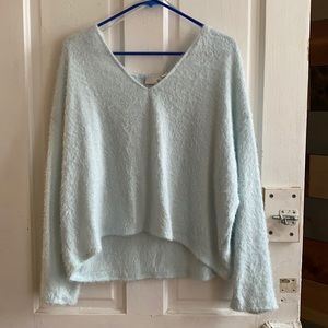 Light blue fuzzy crop top sweater.  Size XXL